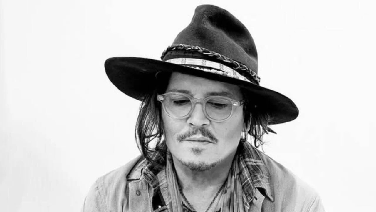 Johnny Depp takes a bite of fake plants at a party in Las Vegas