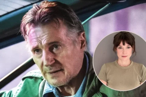 Liam Neeson and Stella Stocker hold hands at the TIFF red carpet